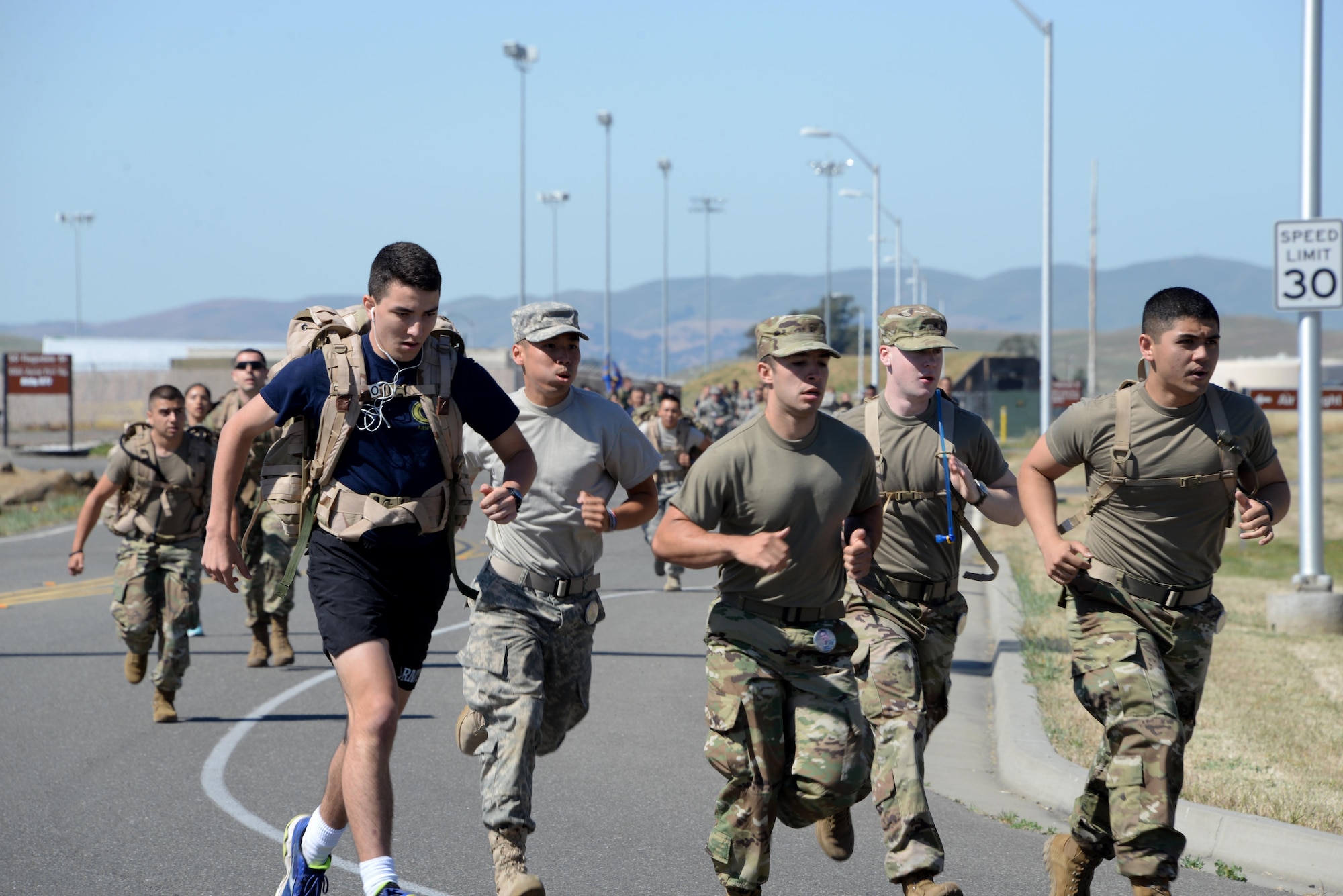Military members and their families participate in the 7th Annual Gold Star Families Ruck March May 20, 2017 at Travis Air Force Base, Calif. The event, which featured 275 participants, is held every year by the Travis First Sergeant's Council to support Gold Star Families. (U.S. Air Force photo/Tech. Sgt. James Hodgman)
