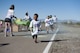 The Youth and Teen Center hosted the Art Blast color run 5K and the America’s Armed Forces Kids fun run at Holloman Air Force Base, N.M on May 20, 2017. During the run, volunteers set up tables along the track with various colored paint powder to toss at the runners transforming their fresh white shirts into a colorful canvas. (U.S. Air Force photo by Airman 1st Class Ilyana A. Escalona)