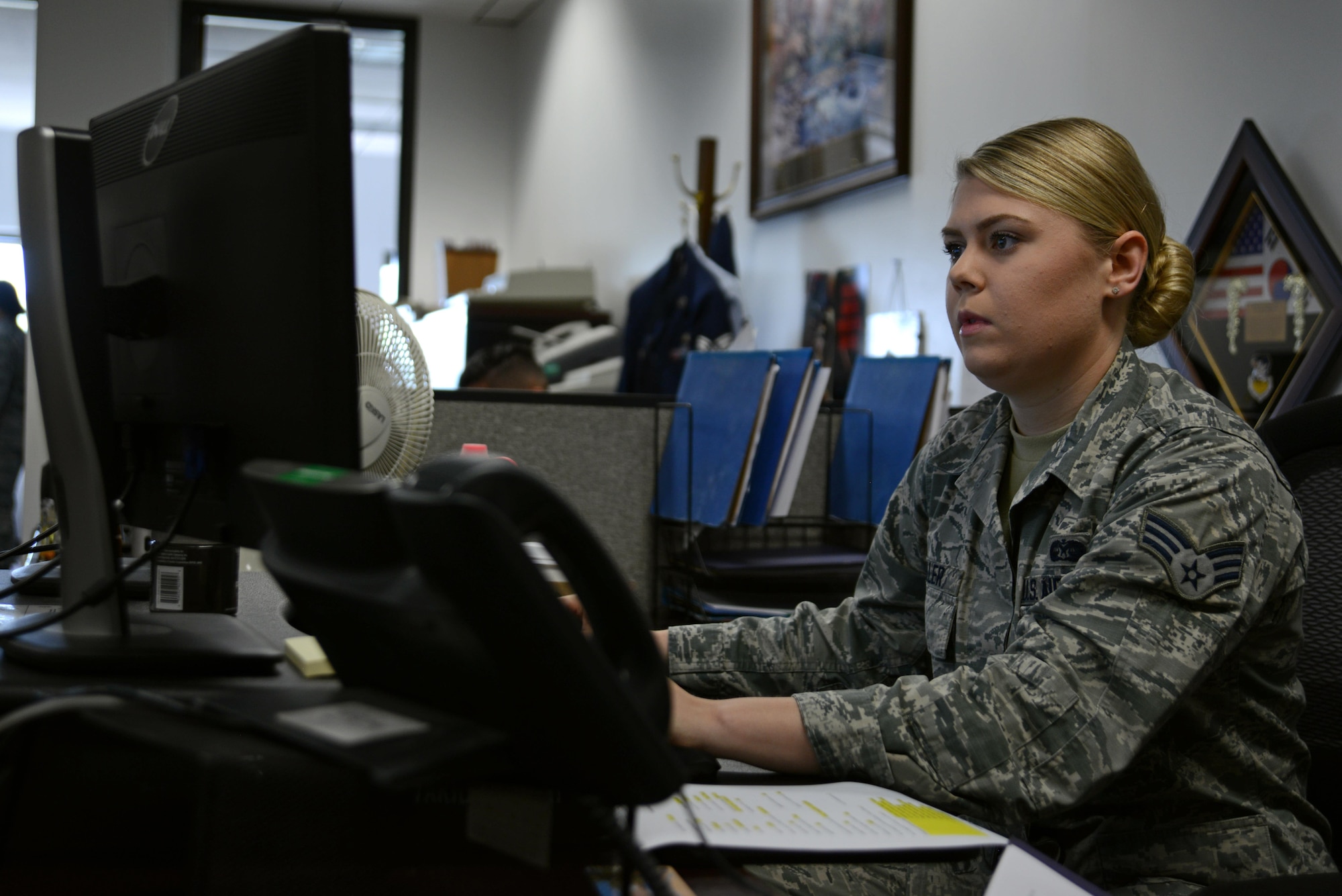 U.S. Air Force Senior Airman Megan Miller, 20th Fighter Wing Judge Advocate military justice paralegal, inputs an Airman’s information into a personal data sheet at Shaw Air Force Base, S.C., May 9, 2017. The form includes details about a service member’s military career and is provided to court members participating in a court-martial. (U.S. Air Force photo by Airman 1st Class Kathryn R.C. Reaves)