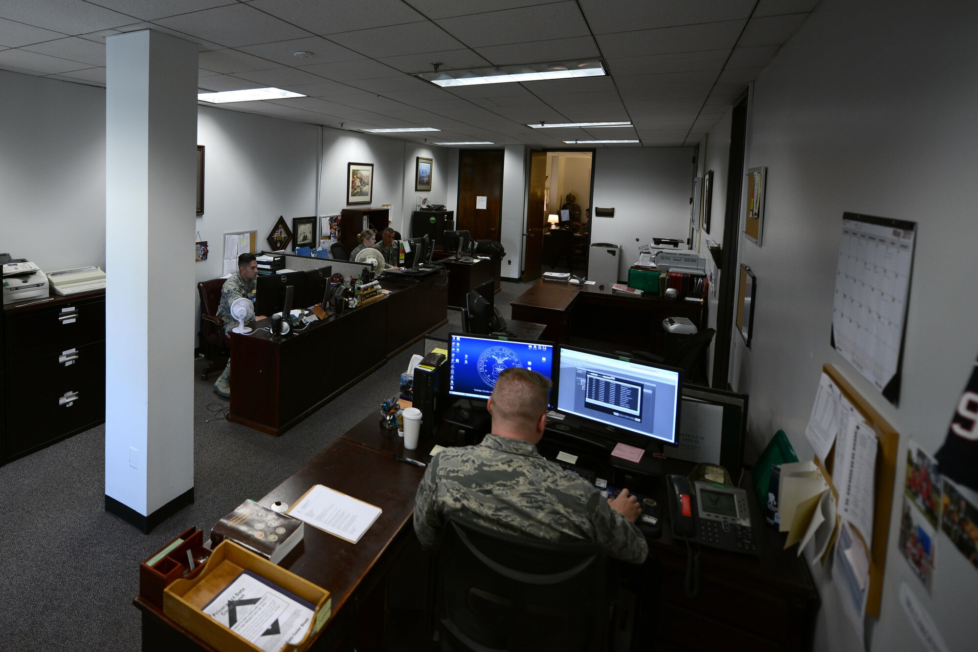 U.S. Airmen assigned to the 20th Fighter Wing Judge Advocate military justice section perform duties at Shaw Air Force Base, S.C., May 9, 2017. The section administers military justice and upholds the law, ensuring the Uniform Code of Military Justice and other legal precedents are protected and enforced. (U.S. Air Force photo by Airman 1st Class Kathryn R.C. Reaves)