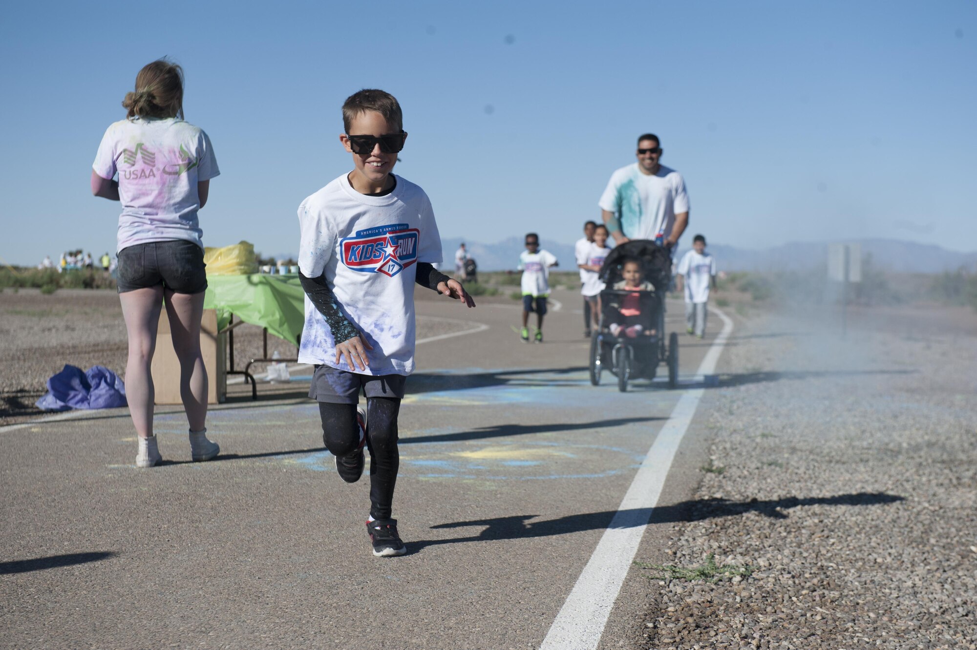 The Youth and Teen Center hosted the Art Blast color run 5K and the America’s Armed Forces Kids fun run at Holloman Air Force Base, N.M on May 20, 2017. During the run, younger children run a half mile, seven and eight year olds run one mile, and the older children run two miles. (U.S. Air Force photo by Airman 1st Class Ilyana A. Escalona)