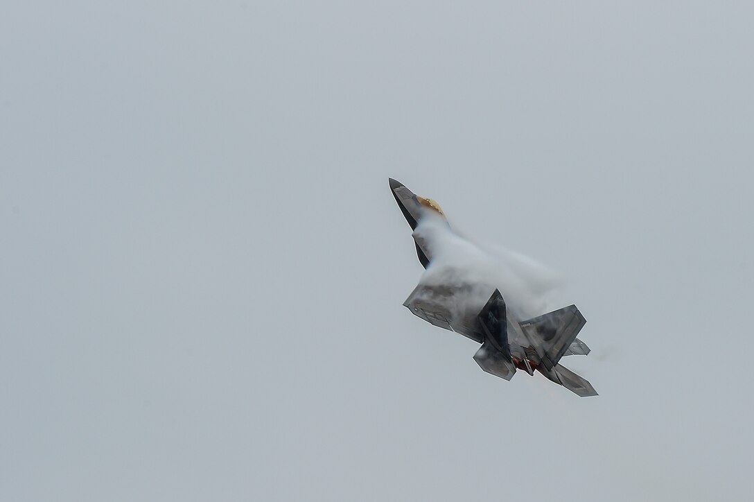 A U.S. Air Force F-22 Raptor gains altitude while performing a demonstration during the 911th Airlift Wing's Wings Over Pittsburgh 2017 Air Show, at Coraopolis, Pa., May 12, 2017. The F-22 demonstration was performed by U.S. Air Force Maj. Dan "Rock" Dickinson, the only pilot on the demo team. (U.S. Air Force photo/Senior Airman Kimberly Nagle)
