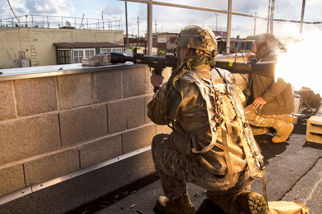 A Maryland Army National Guardsman fires a simulated rocket propelled grenade while participating in a town defense training scenario as part of exercise Saber Junction 17 at the Hohenfels Training Area in Germany, May 15, 2017. Army photo by Spc. Gage Hull