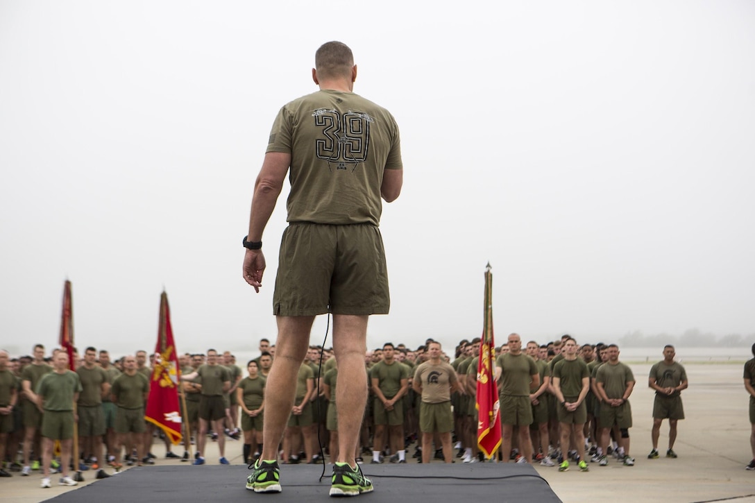 Col. Michael Borgeschulte, Marine Aircraft Group (MAG) 39 commanding officer, addresses the Marines of MAG-39 prior to running the MAG-39 “Victory Lap” around the flightline at Marine Corps Air Station Camp Pendleton, Calif., May 22. Marines from 11 squadrons in MAG-39 participated in the run to celebrate a year of aviation excellence. (U.S. Marine Corps photo by Lance Cpl. Liah Smuin/Released)