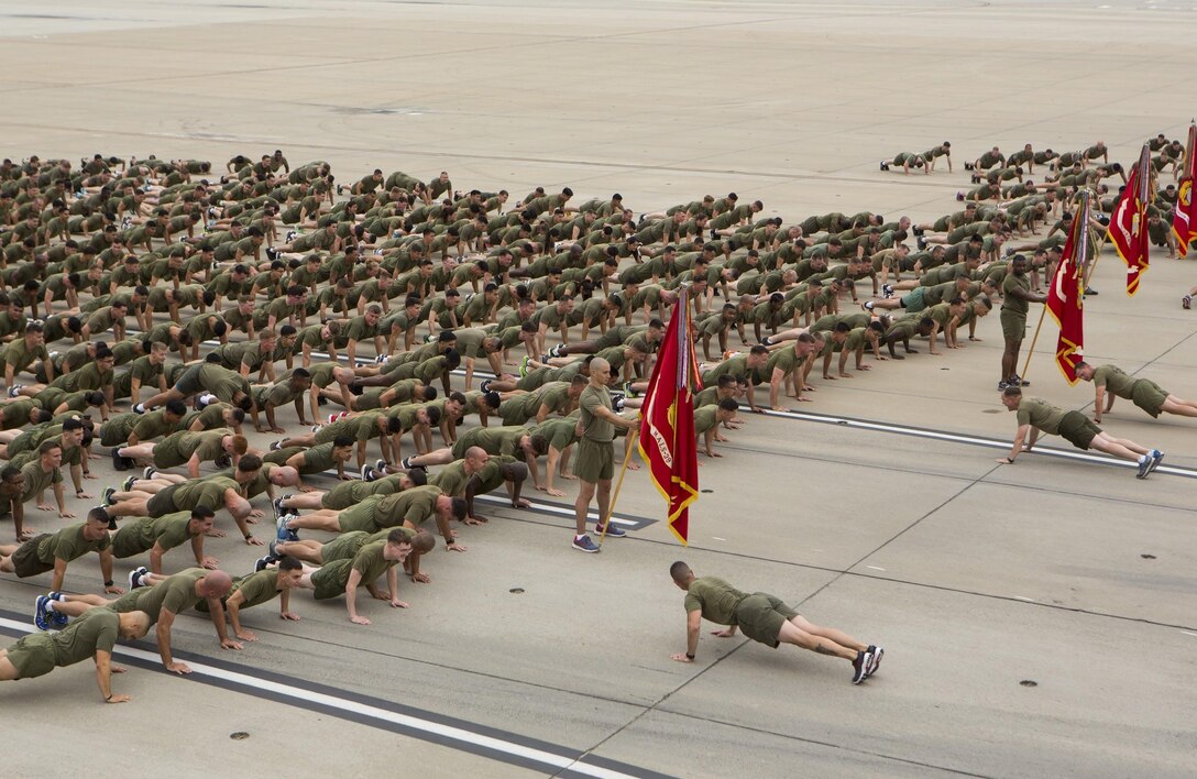 Marines with Marine Aircraft Group (MAG) 39 do push-ups after the MAG-39 “Victory Lap” at the flightline on Marine Corps Air Station Camp Pendleton, Calif., May 22. Marines from 11 squadrons in MAG-39 participated in the run to celebrate a year of aviation excellence. (U.S. Marine Corps photo by Lance Cpl. Liah Smuin/Released)