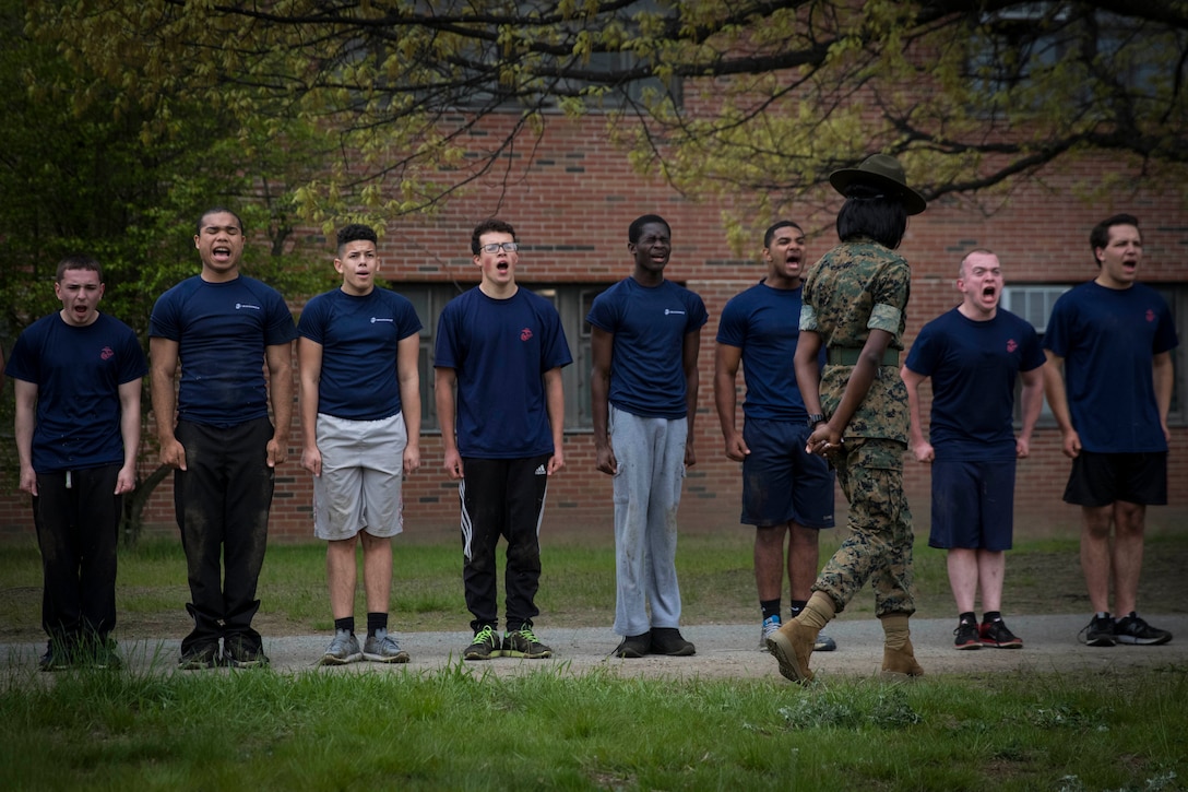 U.S. Marine Corps Sgt. Courtney Holliday engages in “drill instructor time” with Marine enlistees during the annual Recruiting Station Portsmouth All-Hands Pool Function at Fort Devens, Mass., May 13, 2017. The function is a two-day event that helps prepare the station's enlistees for recruit training. Holliday is a drill instructor for Papa Co., 4th Recruit Training Battalion, Marine Corps Recruit Depot Parris Island, S.C.