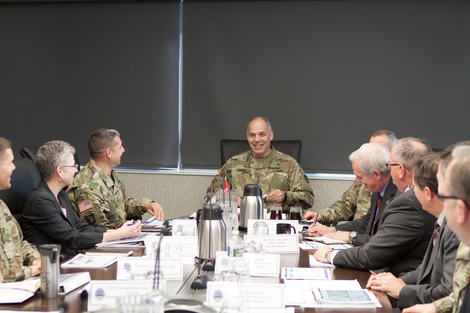 Army Gen. Gustave F. Perna (center), commanding general of the U.S. Army Materiel Command visited DLA Distribution May 18 for an overview of DLA Distribution, and a roundtable discussion with Distribution leadership.