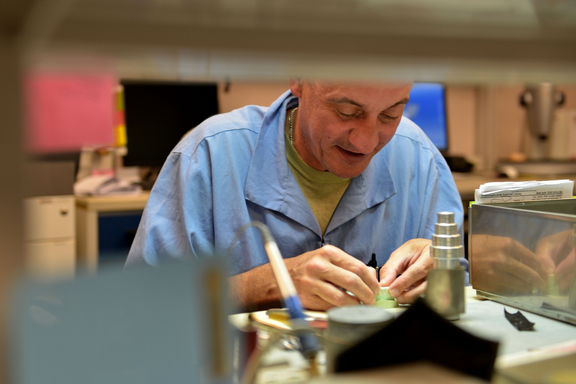 U.S. Air Force Tech. Sgt. Bryan Morris, 20th Dental Squadron dental laboratory flight chief, forms a retainer for a patient at Shaw Air Force Base, S.C., May 18, 2017. Each dental laboratory technician makes about 800 dental appliances per year, including retainers, night guards and crowns. (U.S. Air Force photo by Airman 1st Class Destinee Sweeney)