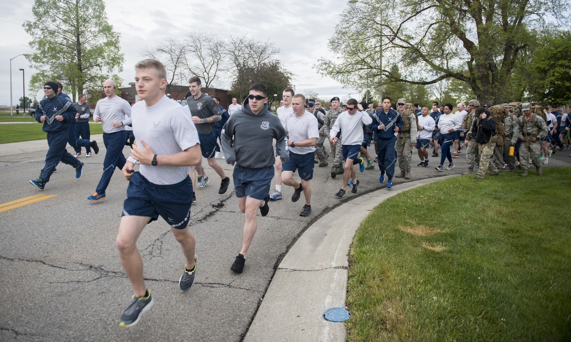 Fairchild Airmen begin Fairchild’s National Police Week 5k Ruck/Run at Miller Park May 17, 2017, at Fairchild Air Force Base, Washington. National Police Week was first designated in 1962 by President John F. Kennedy. (U.S. Air Force Photo/ Airman 1st Class Sean Campbell) 