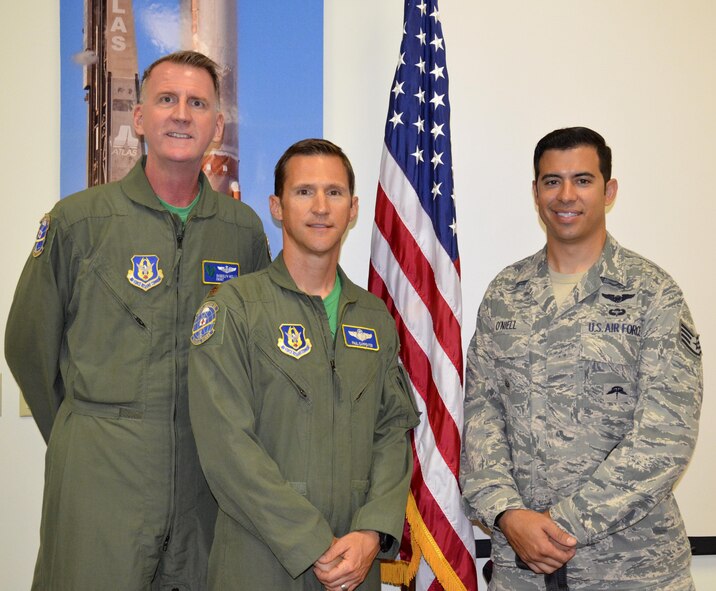Staff Sgt. August O’Niell, (right), pararescueman, and his wingmen, Maj. Paul Carpenter (center), HH-60G Pave Hawk helicopter instructor pilot, and Chief Master Sgt. Randolph Wells, special mission aviation superintendent, gave a presentation on resiliency to 45th Space Wing and Air Force Technical Applications Center Airmen May 19 and 22. The three embarked on a 2011 deployment to save lives when O’Niell was shot through both legs during a combat rescue mission in Afghanistan. (U.S. Air Force photo SrA Brandon Kalloo Sanes)