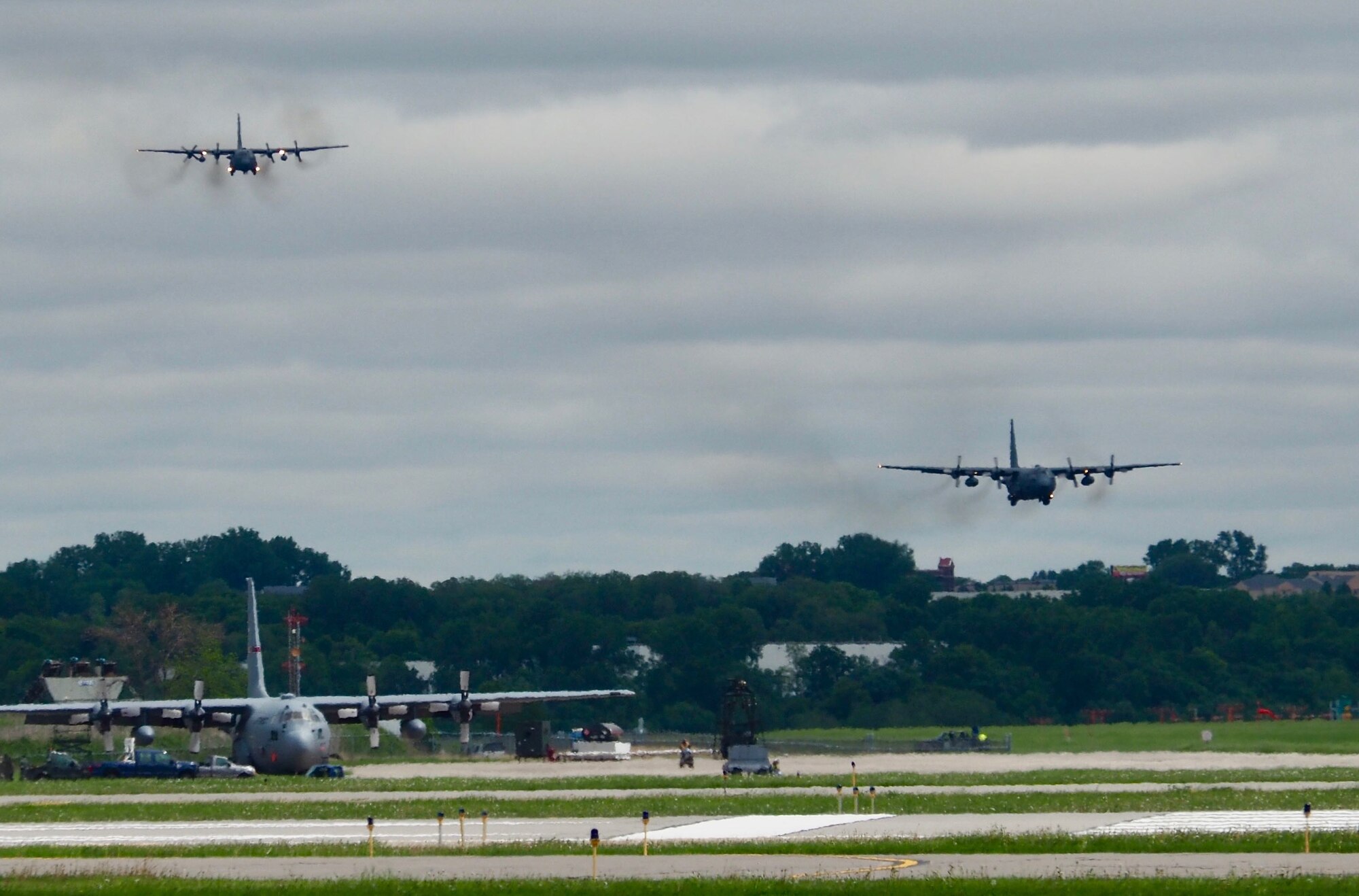 934th Airlift Wing C-130s approach the runway as they return from their four month deployment May 18. (Air Force Photo/Paul Zadach)