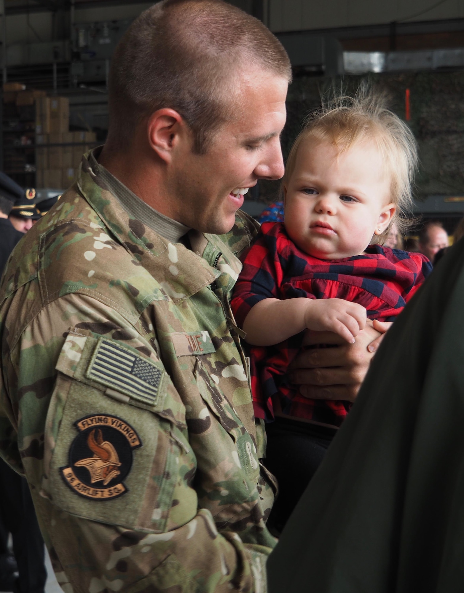 1st. Lt. Dan Tate is ready to celebrate his daughter's first birthday after returning from his deployment May 18. (Air Force Photo/Paul Zadach)
