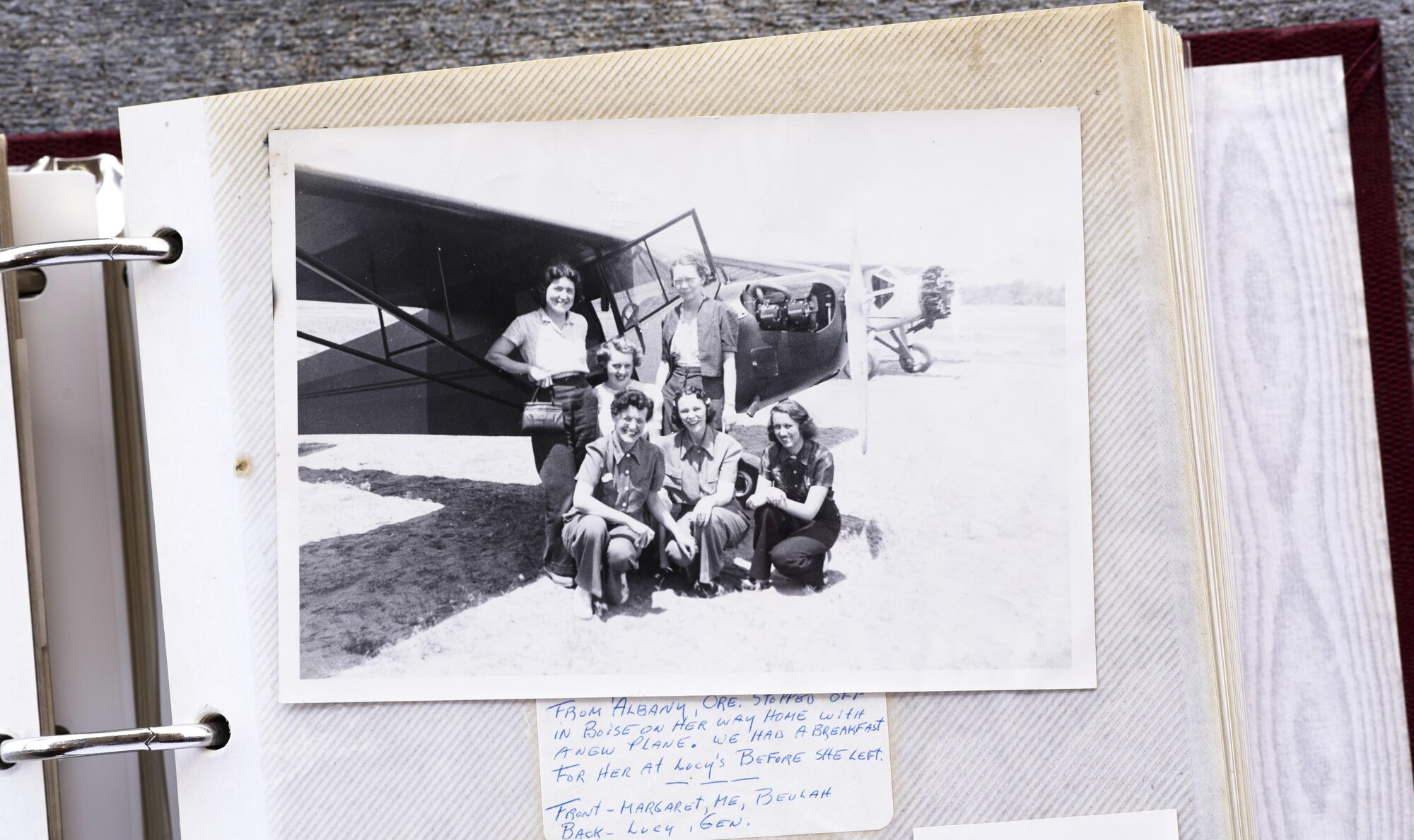 Elaine McCalley poses with her friends in front of a new plane in Boise, Idaho. She was inducted into the Idaho Aviation Hall of Fame.(U.S. Air Force Photo by Senior Airman Jeremy L. Mosier)