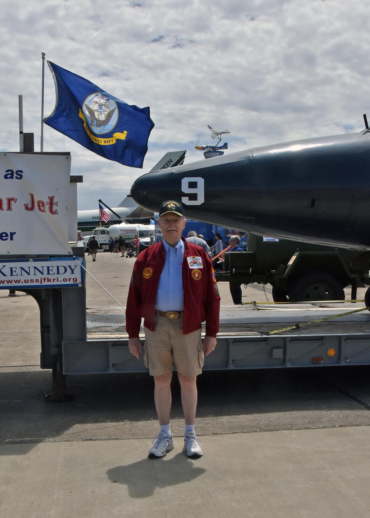 A military veteran poses for a photo at the 2017 Rhode Island National Guard Open House and Air Show held at Quonset Air National Guard Base, May 20-21, 2017. The open house allows the RING the opportunity to invite the community to enjoy meeting the Airmen and Soldiers of the RING and get treated to a world class air show.