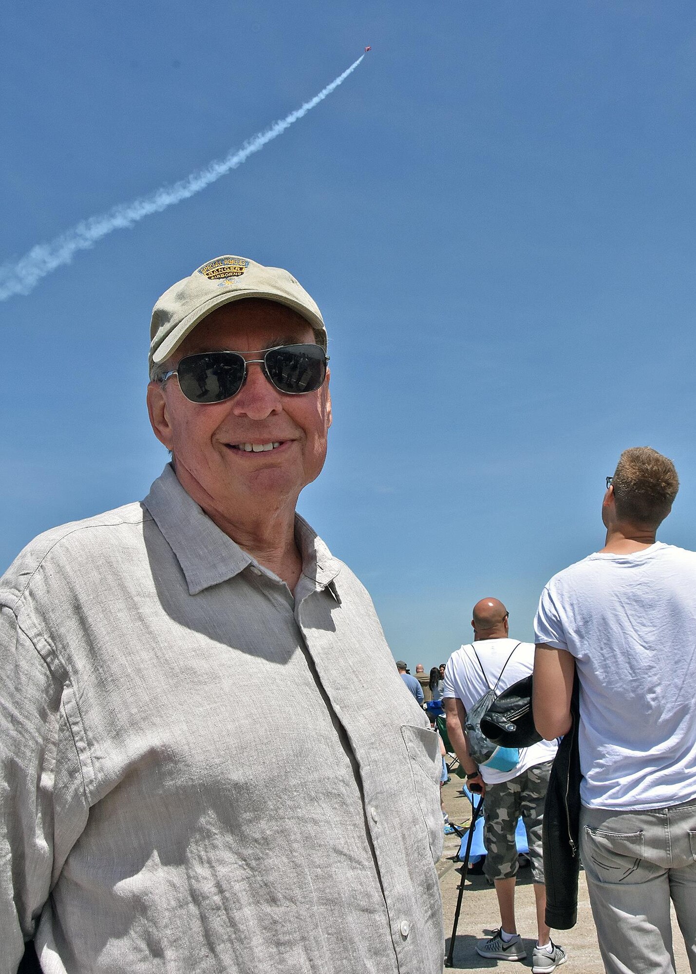 A military veteran poses for a photo at the 2017 Rhode Island National Guard Open House and Air Show held at Quonset Air National Guard Base, May 20-21, 2017. The open house allows the RING the opportunity to invite the community to enjoy meeting the Airmen and Soldiers of the RING and get treated to a world class air show.