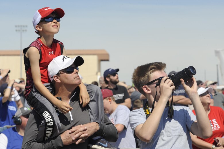 Spectators enjoy the Tinker Air Force Base Star Spangled Salute air show May 20, 2017, Tinker Air Force Base, Oklahoma. The show was attended by an estimated 100,000 people, which set an attendance record for the Tinker AFB air show. (U.S. Air Force photo/Greg L. Davis)