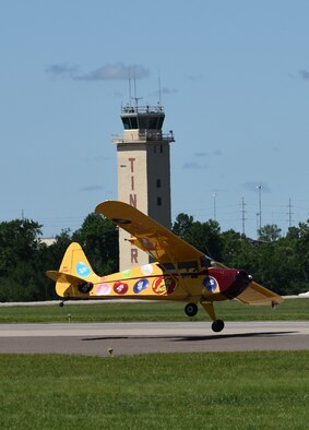 As part of his comedy act, pilot Kent Pietsch bounces his Jelly Belly Interstate Cadet down Tinker’s runway during the Star Spangled Salute Air Show May 20, 2017, at Tinker Air Force Base, Oklahoma. (Air Force photo by April McDonald)