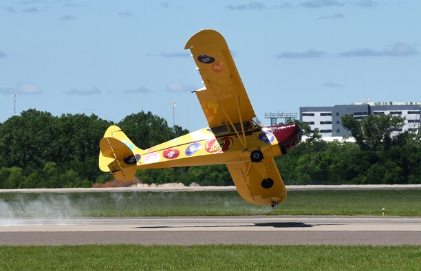 During his comedy routine at Star Spangled Salute May 20, 2017, Kent Pietsch delights the crowd as he performs aerobatic stunts in his Jelly Belly Interstate Cadet, all while pretending he’s an amateur. (Air Force photo by April McDonald)