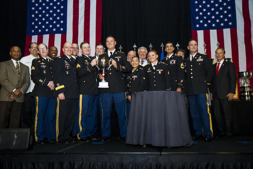 U.S. Army Reserve Soldiers from the 391st Military Police Battalion, of Columbus, Ohio, receive the Philip A. Connelly Award in Chicago, Illinois on May 19, 2017. The Department of the Army’s Connelly Awards is an annual military competition, which uses military and civilian evaluators from the National Restaurant Association to recognize military units for excellence in Army food service. This year’s winner was the 391st MP Bn., under the 200th MP Command, representing the U.S. Army Reserve. Winning teams from the active components and National Guard also attended the dinner. (U.S. Army Reserve photo by Maj. Saphira Ocasio)