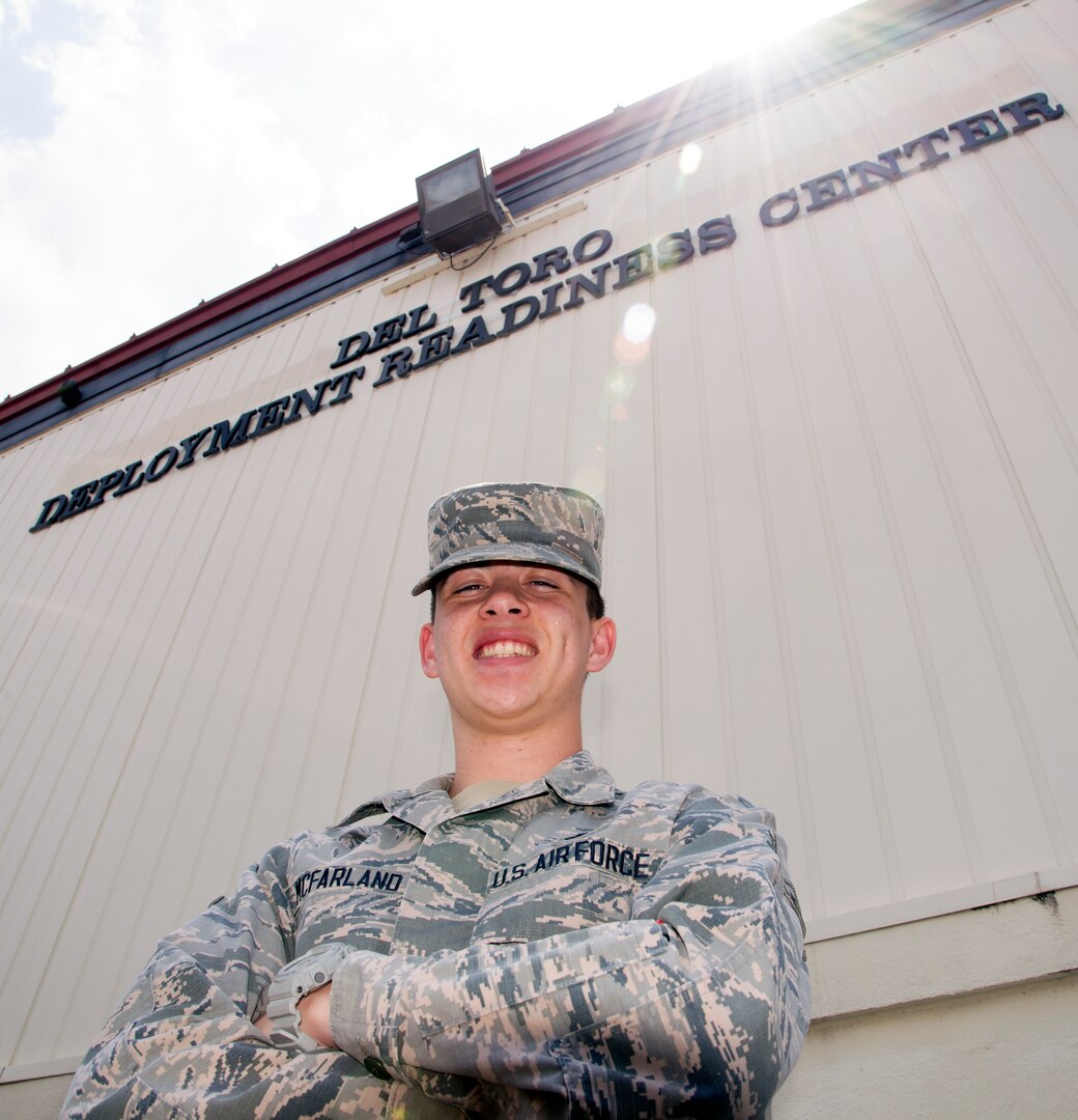 Airman Ethan McFarland, 502nd Logistics Readiness Squadron logistics planner, poses in front of the Del Toro Deployment Readiness Center at Joint Base San Antonio-Randolph, May 23, 2017. McFarland is a wing deployment coordinator for Joint Base San Antonio-Fort Sam Houston and JBSA-Randolph. As a deployment coordinator, he deploys personnel and cargo to places all around the world. 
