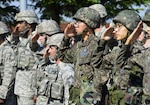 U.S. Air Force 51st Security Forces Squadron and Republic of Korea Military Police members render a salute during a Memorial Retreat Ceremony, at Osan Air Base, Republic of Korea, May 19, 2017. The solemn ceremony was the height of Police Week, a week dedicated to honoring those who gave the ultimate sacrifice in the line of duty.