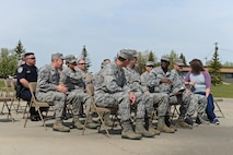 Base leadership, Airmen and local police officers sit during the National Police Week retreat ceremony at Minot Air Force Base, N.D., May 19, 2017. National Police Week honors law enforcement personnel around the world who have made the ultimate sacrifice. (U.S. Air Force photo/Airman 1st Class Austin M. Thomas)