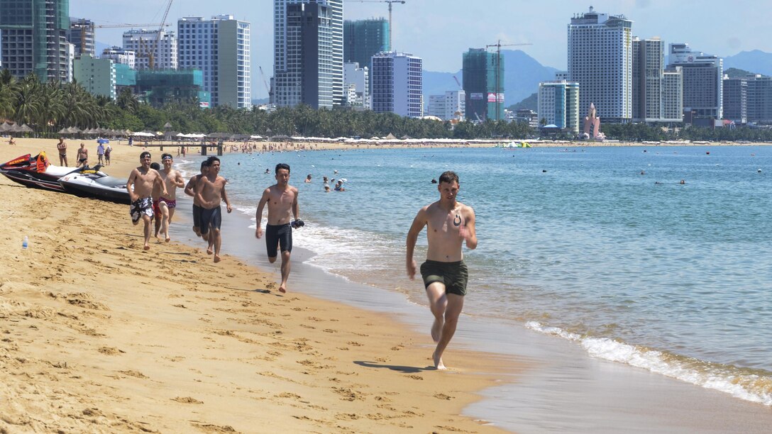 U.S. Navy, Marine Corps and Coast Guard personnel participate in a lifeguard field training exercise with Japanese sailors and Vietnamese lifeguards at a beach in Nha Trang, Vietnam, May 23, 2017, during Pacific Partnership 2017. Pacific Partnership is an annual humanitarian assistance and disaster relief preparedness mission in the Indo-Asia-Pacific region. Navy photo by Petty Officer 3rd Class Madailein Abbott