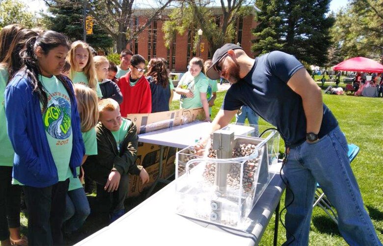 TRINIDAD, COLO. – District employee Jesse Gutierrez points out one of the dams features to students attending the 6th Annual Trinidad Water Festival, May 18, 2017.