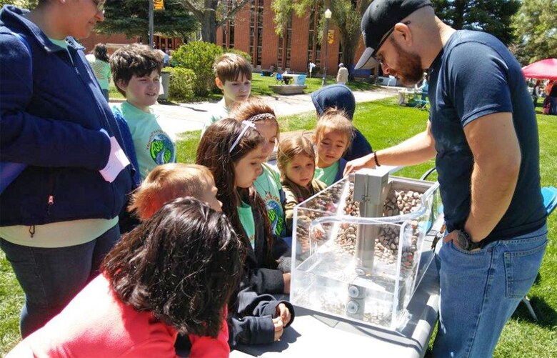 TRINIDAD, COLO. – District employee Jesse Gutierrez points out one of the dams features to students attending the 6th Annual Trinidad Water Festival, May 18, 2017