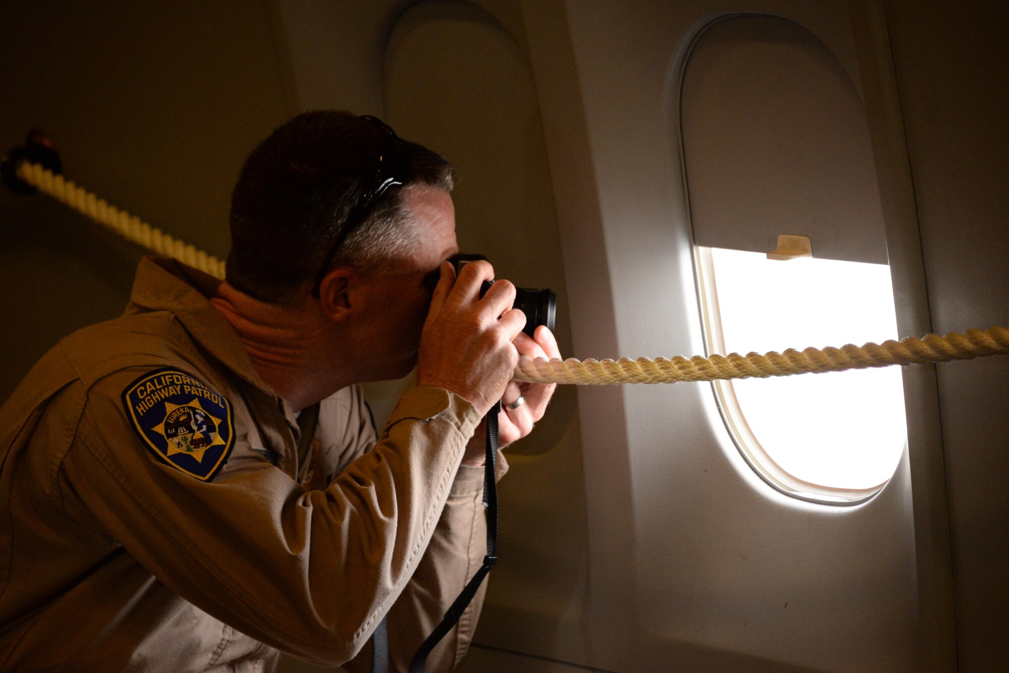 California Highway Patrol Officers fly aboard a KC-10 Extender May 11 at Travis Air Force Base, Calif. CHP were able to fly on a regularly scheduled training mission with the 6th Air Refueling Squadron to familiarize themselves with the Travis mission and air space. (U.S. Air Force photo by Senior Airman Amber Carter)