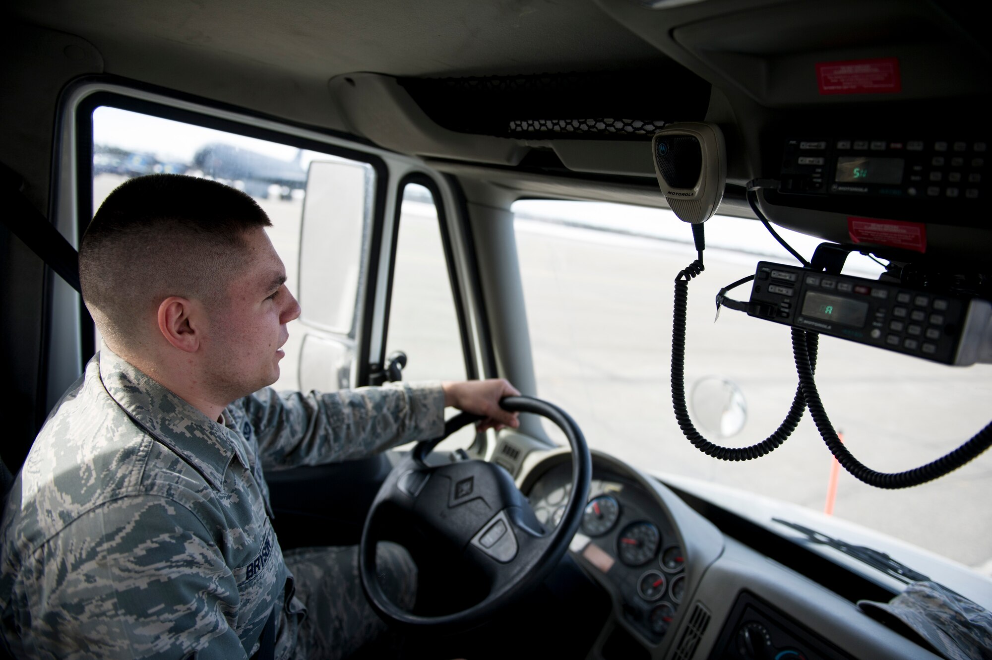 U.S. Air Force Airman 1st Class Seth Bryson, a 354th Civil Engineer Squadron pavement and construction equipment operator, sweeps the flight line of foreign object debris April 10, 2017, at Eielson Air Force Base, Alaska. During both summer and winter months the “Dirt Boyz” main priority is to keep the flight line clean. (U.S. Air Force photo by Airman 1st Class Isaac Johnson)