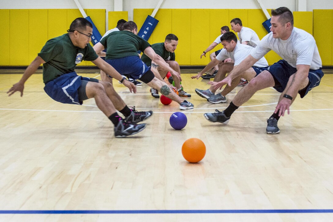 Airmen assigned to the 60th Air Mobility Wing participate in a Wingman Day event at Travis Air Force Base, Calif., May 19, 2017. Wingman Day is an Air Force secretary and chief of staff directive aimed at ensuring strong mental, physical, social and spiritual fitness among airmen. Air Force photo by Louis Briscese