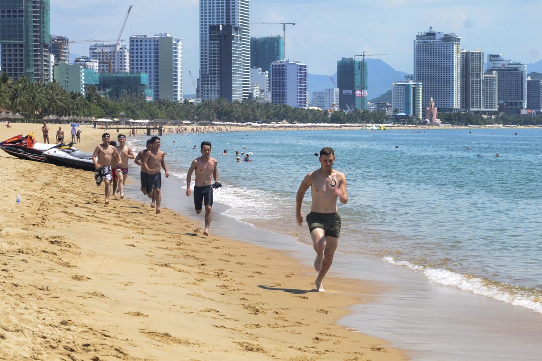 U.S. Navy, Marine Corps and Coast Guard personnel participate in a lifeguard field training exercise with Japanese sailors and Vietnamese lifeguards at a beach in Nha Trang, Vietnam, May 23, 2017, during Pacific Partnership 2017. Pacific Partnership is an annual humanitarian assistance and disaster relief preparedness mission in the Indo-Asia-Pacific region. Navy photo by Petty Officer 3rd Class Madailein Abbott