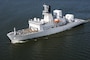 The USNS Howard O. Lorenzen (T-AGM-25) passes Astoria, Ore., as it departs the Columbia River into the Pacific Ocean, May 16, 2014. The USNS Howard O. Lorenzen is named for the late Naval Research Laboratory electrical engineer who was instrumental in the creation of the electronic intelligence capabilities of the United States. (U.S. Coast Guard photo by Petty Officer 1st Class David Mosley)