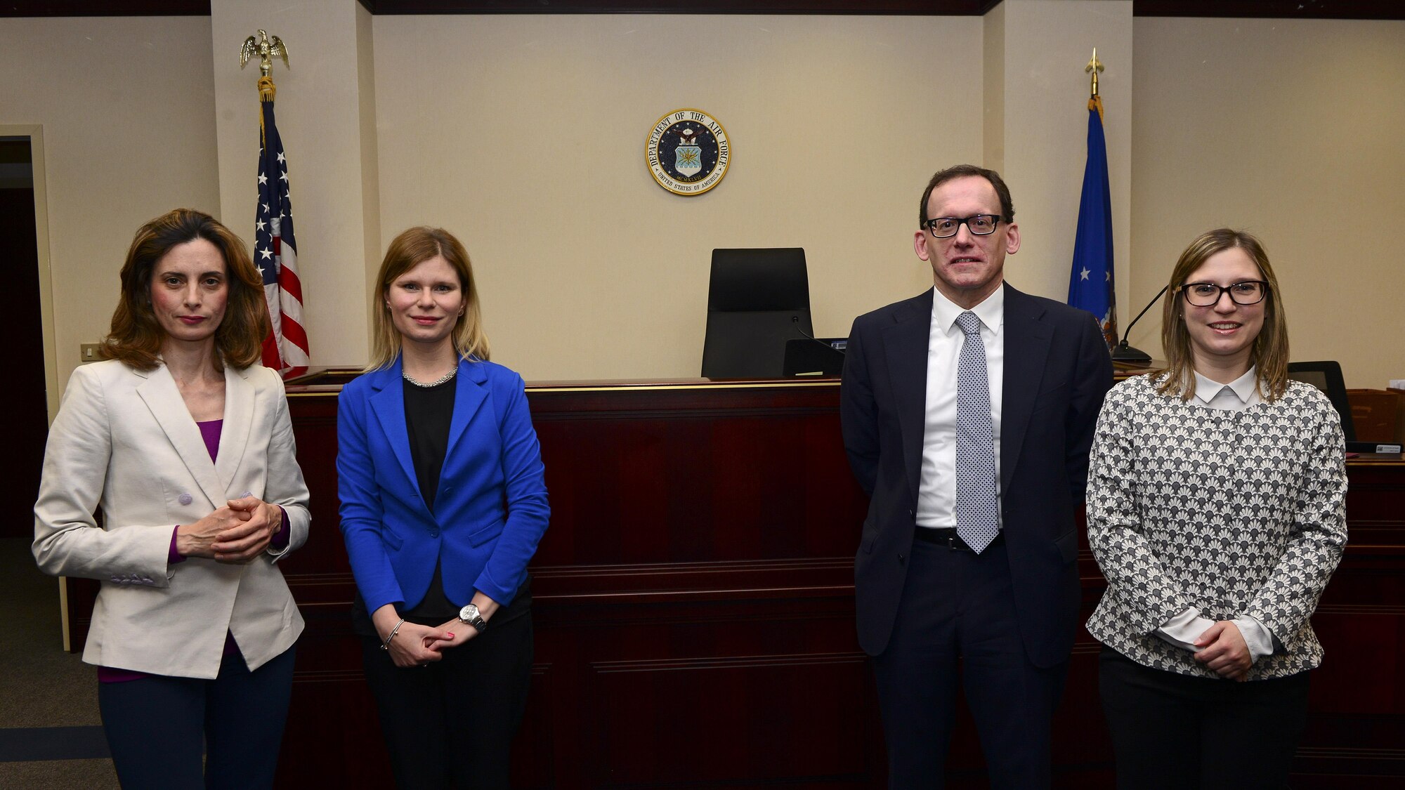 Italian lawyers visit the 31st Fighter Wing Judge Advocate for a cultural and judicial exchange of ideas to build on professional relationships during a court-martial, May 16-18, 2017, Aviano Air Base, Italy.  Sixteen Italian lawyers participated in the Court-Martial Observer Program to see the courtroom, survey the trial process and observe the panel, or jury, selection. (U.S. Air Force photo by Airman 1st Class Ryan Brooks)