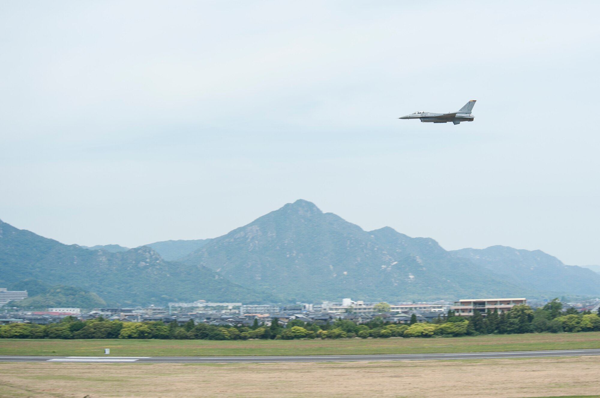 U.S. Air Force Maj. Richard Smeeding, the Pacific Air Forces F-16 Demonstration Team pilot, flies across the sky during the Hofu Air Festival, at Hofu-kita Air Base, Japan, May 21, 2017. Smeeding performed an 15-minute demonstration that showcased the F-16 Fighting Falcon power and maneuverability. (U.S. Air Force photo by Staff Sgt. Melanie Hutto)