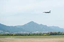 U.S. Air Force Maj. Richard Smeeding, the Pacific Air Forces F-16 Demonstration Team pilot, flies across the sky during the Hofu Air Festival, at Hofu-kita Air Base, Japan, May 21, 2017. Smeeding performed an 15-minute demonstration that showcased the F-16 Fighting Falcon power and maneuverability. (U.S. Air Force photo by Staff Sgt. Melanie Hutto)