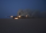 A U.S. Air Force Air National Guard C-130 Hercules with the 127th Airlift Wing controlled by a U.S. Air Force Special Tactics combat controller, lands in a dry lake bed during Exercise Eager Lion May 16, 2017, in Jordan. Special Tactics teams can assess, open, and control major airfields to clandestine dirt strips in either permissive or hostile locations, providing strategic access for U.S. or allied partners. (U.S. Air Force photo by Senior Airman Ryan Conroy)