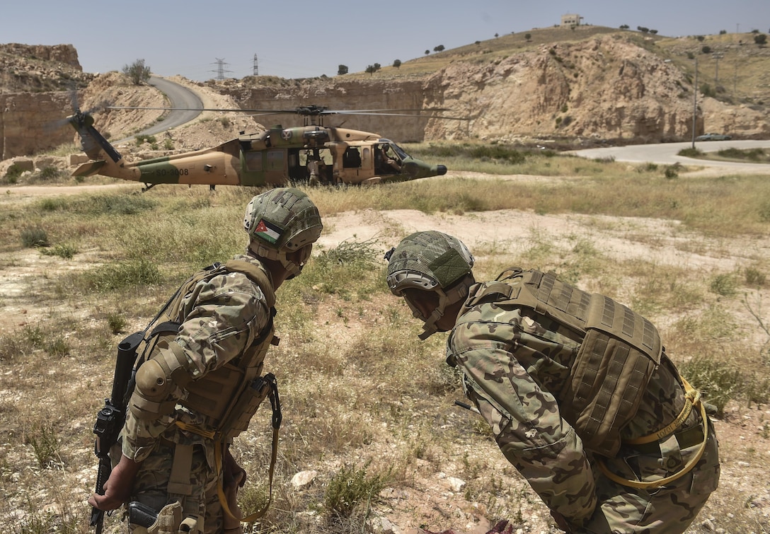 Members of the Jordanian Armed Forces Special Task Force prepare for extraction during a combat search and rescue mission at Eager Lion May 11, 2017, at King Abdullah II Special Operations Training Center. Eager Lion is an annual U.S. Central Command exercise in Jordan designed to strengthen military-to-military relationships between the U.S., Jordan and other international partners. This year's iteration is comprised of about 7,200 military personnel from more than 20 nations that will respond to scenarios involving border security, command and control, cyber defense and battlespace management. (U.S. Air Force photo by Senior Airman Ryan Conroy)