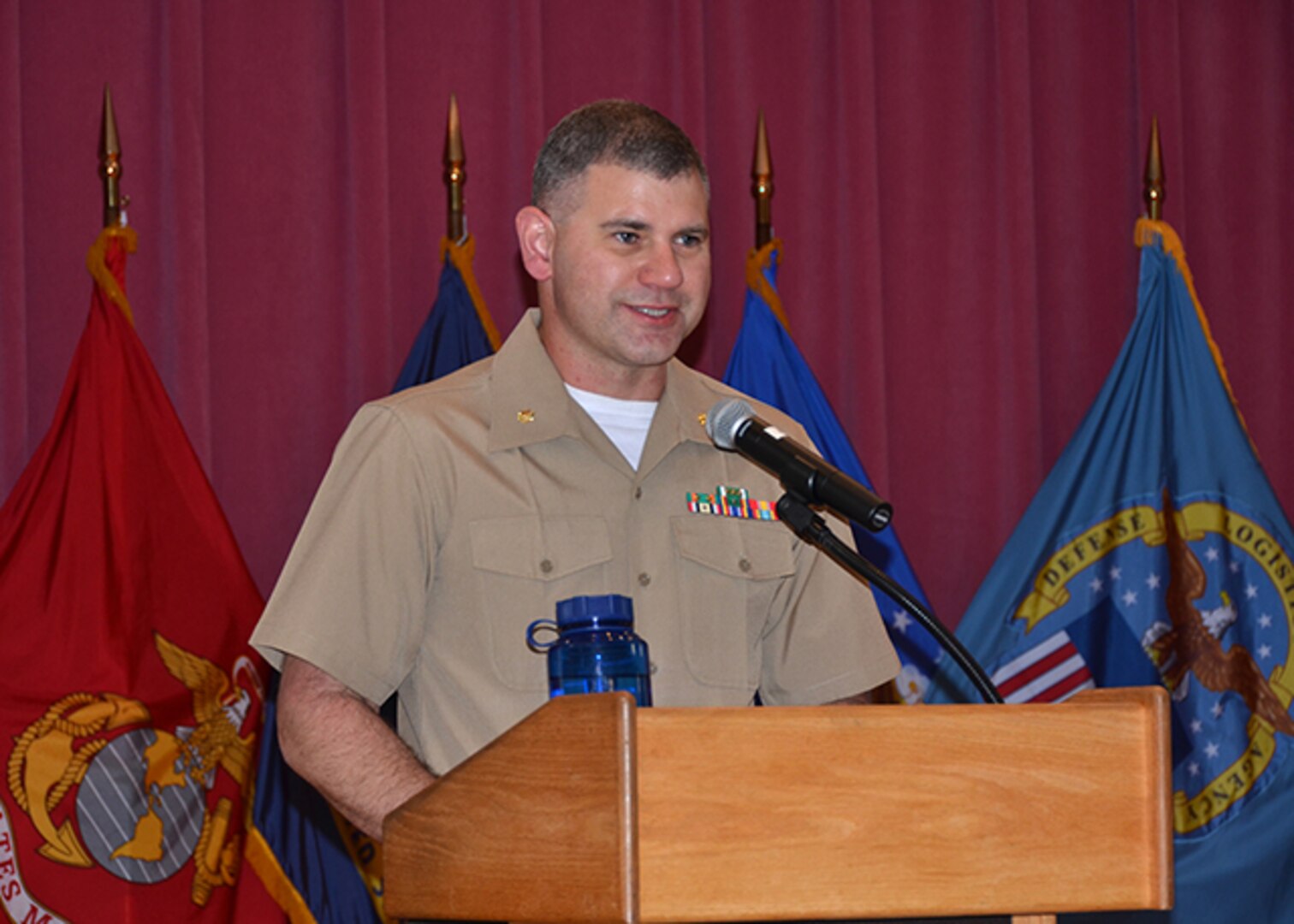 Marine Corps Maj. Chris Story serves as the master of ceremonies at the DLA Aviation Marine Corps’ 105th aviation birthday celebration held May 22, 2017 in the Center Restaurant on Defense Supply Center Richmond, Virginia. 