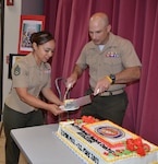 Marine Corps Col. A. J. Manuel, Defense Logistics Agency Aviation Marine Corps logistics lead, serves cake to Marine Corps Staff Sgt. Elizabeth Najieb, a V-22 weapon system customer account specialist, Marine Division, Customer Operations Directorate, DLA Aviation, during the DLA Aviation Marine Corps’ 105th aviation birthday celebration held May 22, 2017 in the Center Restaurant on Defense Supply Center Richmond, Virginia.  The cake was made by Juan Delvalle, a retired food service Marine instructor from Fort Lee, Virginia’s Marine Corps Detachment Food Service School.