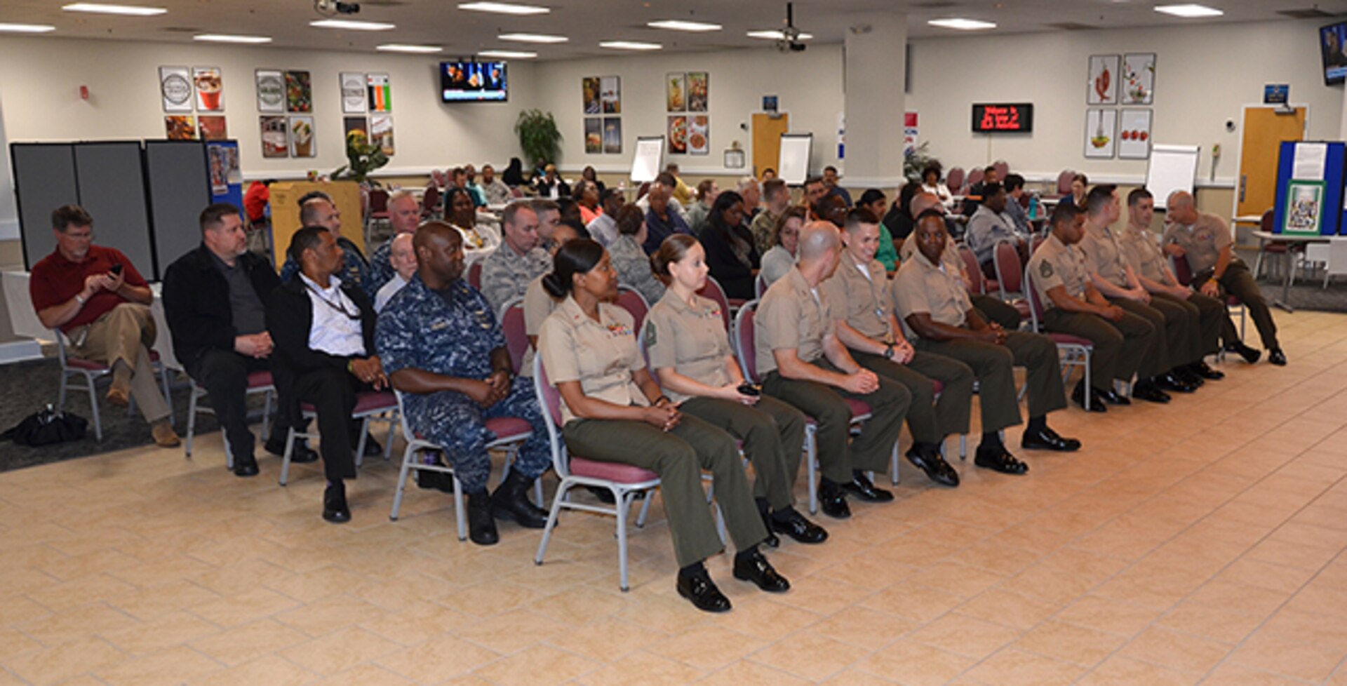 DLA Aviation Marines, friends and members of sister military services attend the DLA Aviation Marine Corps’ 105th aviation birthday celebration held May 22, 2017 in the Center Restaurant on Defense Supply Center Richmond, Virginia.  