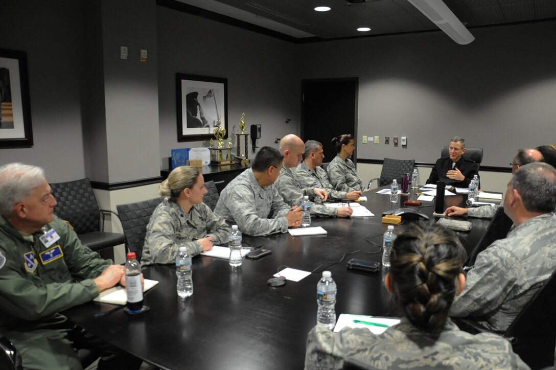 Rear Adm. David A. Lane (fourth from right), National Capital Region (NCR) Medical Directorate director, Defense Health Agency, meets with 779th Medical Group leaders May 24, 2017 at Joint Base Andrews, Md. During the meeting, They discussed the director's vision regarding how Malcolm Grow Medical Clinics and Surgery Center fit into the NCR construct,  how the National Defense Authorization Act will affect the region's medical services and how he can support the 779th Medical Group. (U.S. Air Force photo by Staff Sgt. Joe Yanik)