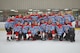 The 552nd Air Control Wing Canadian Detachment team lines up with the CAN/US Cup after defeating the Americans 5-1 in the ninth annual match-up at the Blazers Ice Center in Oklahoma City on May 12.  The series is now 6-3 Americans.