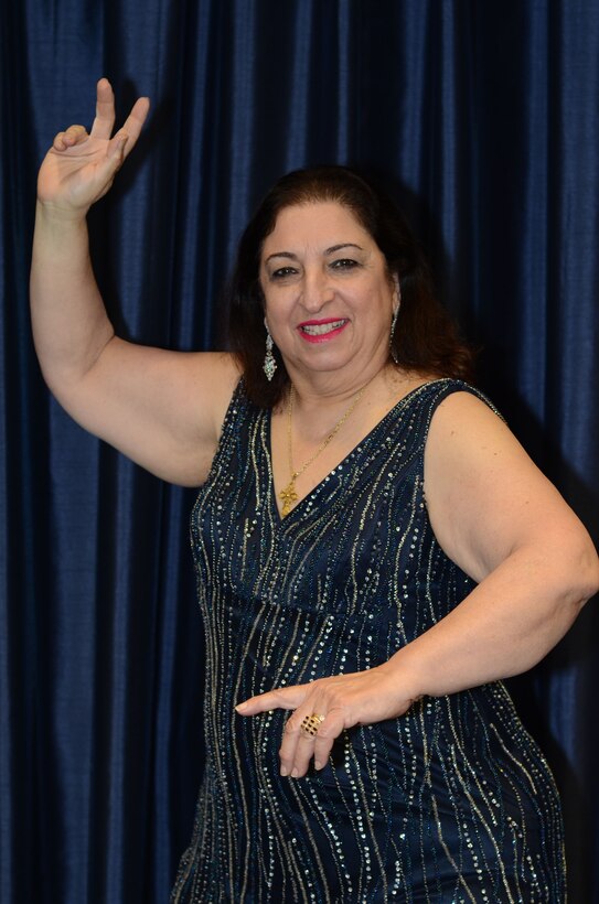 Ingrid Ayber Jackson, a curriculum developer at the Defense Information School on Fort Meade, Maryland, shows off her ballroom flair at the schoolhouse May 4, 2017. She began ballroom dance classes with her husband the summer of 2014 to prepare for their daughter's wedding. (U.S. Army photo by Spc. Tanisha Karn)