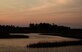 The sun sets over brackish marshes at Joint Base Langley-Eustis, Va., May 10, 2017. Brackish marshes are ideal nesting places to Diamondback Terrapin Turtles, which is a declining species. (U.S. Air Force photo by Staff Sgt. Natasha Stannard)