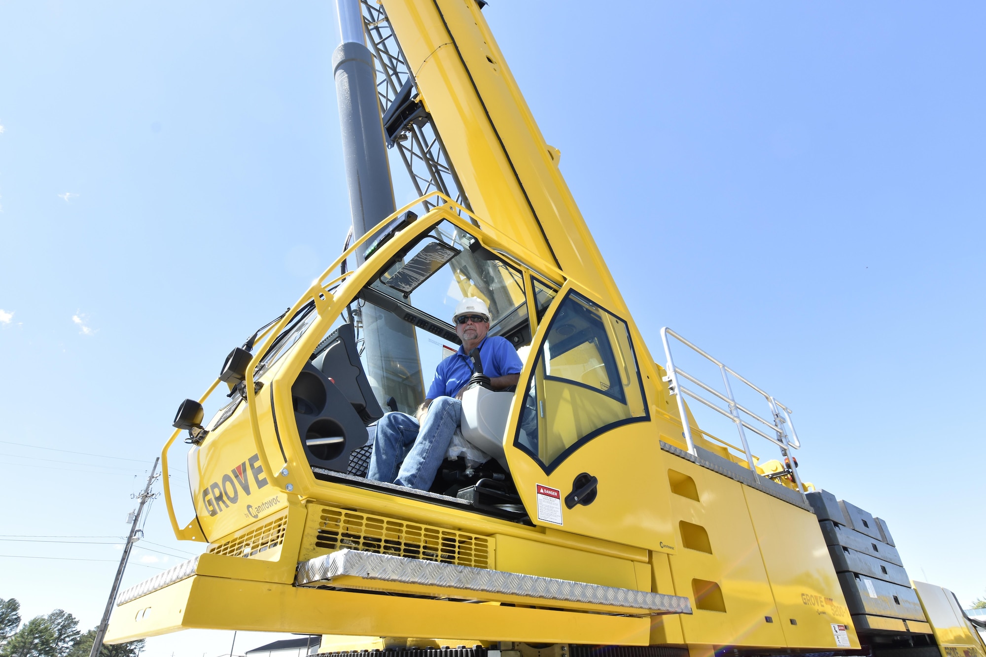 Barry McWhorter, crane operator at Arnold Air Force Base, tries out the new crane purchased to perform maintenance and repair of Arnold AFB support assets. The crane arrived at Arnold AFB on April 28. (U.S. Air Force photo/Rick Goodfriend) 