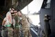 Airmen from the 41st Helicopter Maintenance Unit discuss procedure for loading an HH-60G Pave Hawk into a C-17 Globemaster III, May 15, 2017, at Moody Air Force Base, Ga. Loading the helicopter for transport was the first step in a rapid-rescue exercise conducted at Langley AFB, Va., which was designed to test the maintainer’s and aircrew’s ability to quickly set up and conduct rescue operations away from their home station. (U.S. Air Force photo by Staff Sgt. Ryan Callaghan)