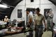 Staff Sgt. Cari Snyder, 349th Aeromedical Squadron medical technician, helps carry a litter during a mass casualty exercise at Travis Air Force Base, Calif., on May 19, 2017. The 349th Medical Group conducted a week-long course for medical Airmen from the 349th and 129th MDGs that culminated in a mass casualty exercise.  (U.S. Air Force photo/Staff Sgt. Daniel Phelps)