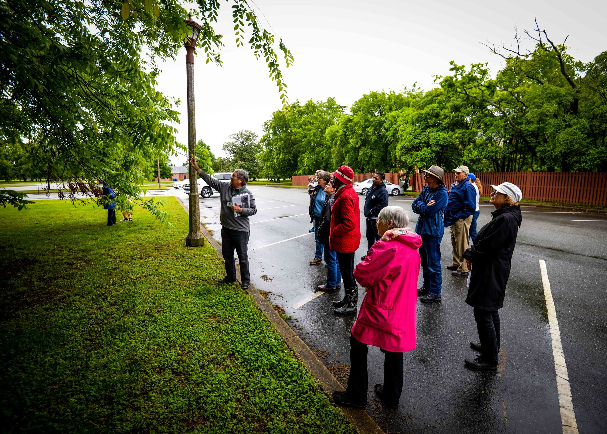 Attendees participate in the Hampton Clean City Commission’s Spring Tree Tour, at Joint Base Langley-Eustis, Va., May 13, 2017. During the tour, attendees learned about the characteristics of a variety of trees on base. (U.S. Air Force photo/Alicia Garcia)